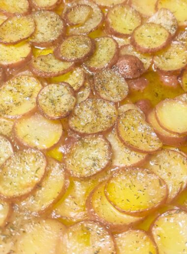 pommes boulangere in a large pan